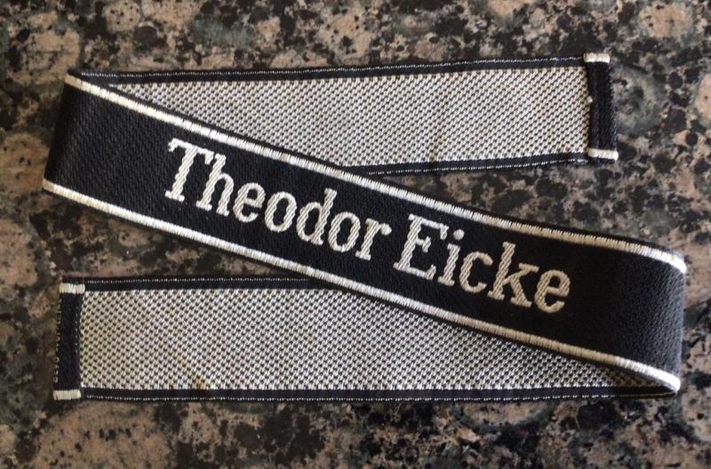 MINT WOVEN THEODOR EICKE OFFICER TITLE.