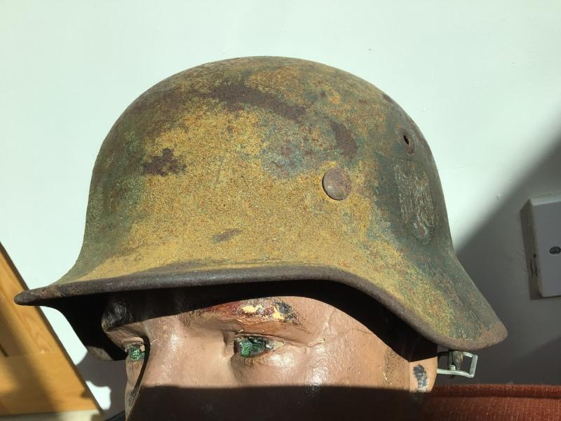 SINGLE DECAL CAMOUFLGED M40 HELMET.